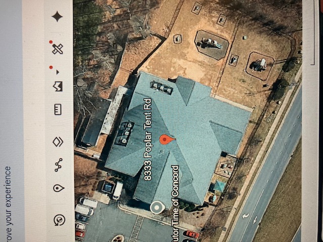 Aerial view of commercial rooftop HVAC units in Concord, North Carolina during a replacement quote assessment